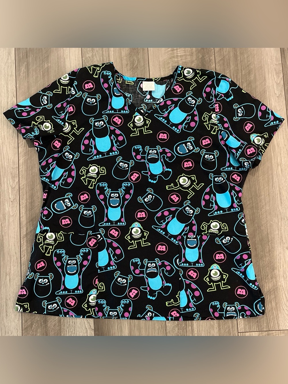 Disney’s Monsters Inc Black Short Sleeve Scrub Top